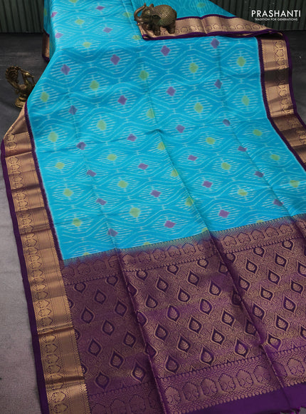 Ikat soft silk saree teal blue and violet with allover ikat weaves and zari woven border