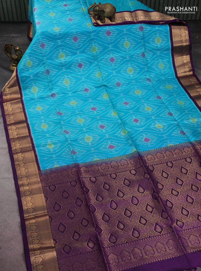 Ikat soft silk saree teal blue and violet with allover ikat weaves and zari woven border