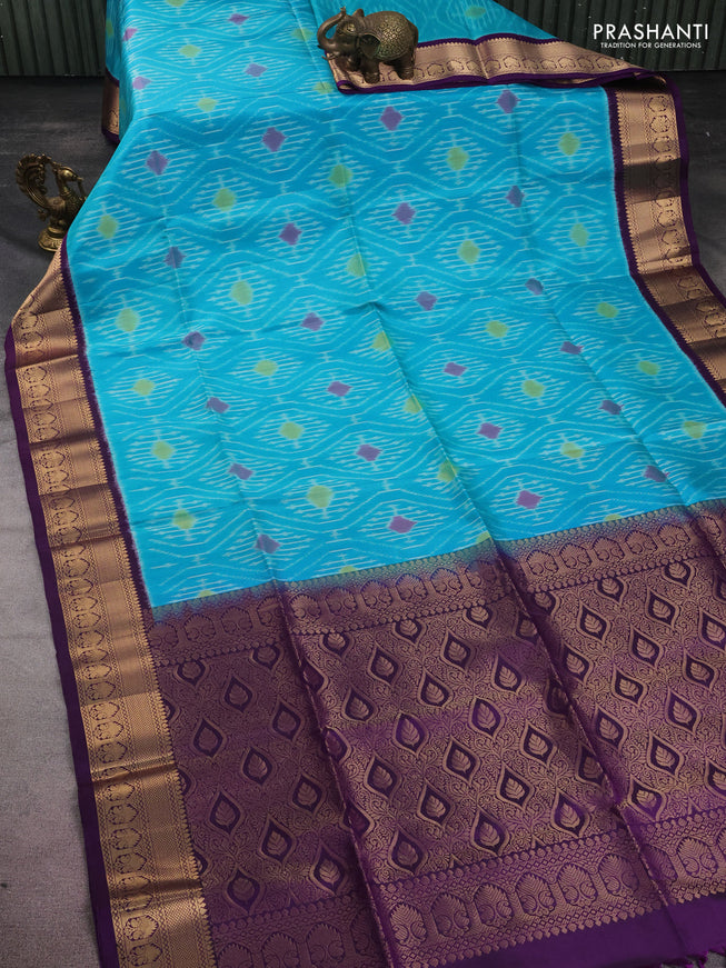 Ikat soft silk saree teal blue and violet with allover ikat weaves and zari woven border
