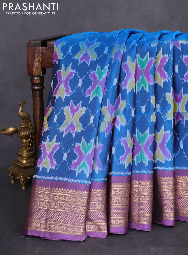 Ikat soft silk saree cs blue and lavender with allover zari woven buttas and zari woven border