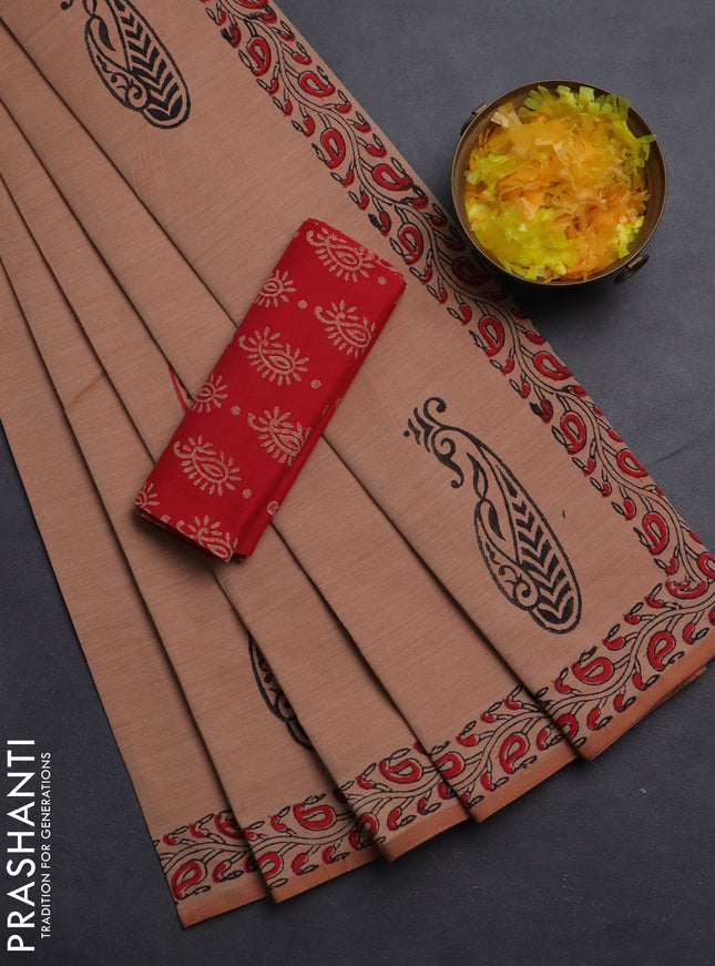 Semi silk cotton saree peach shade with butta prints and printed border