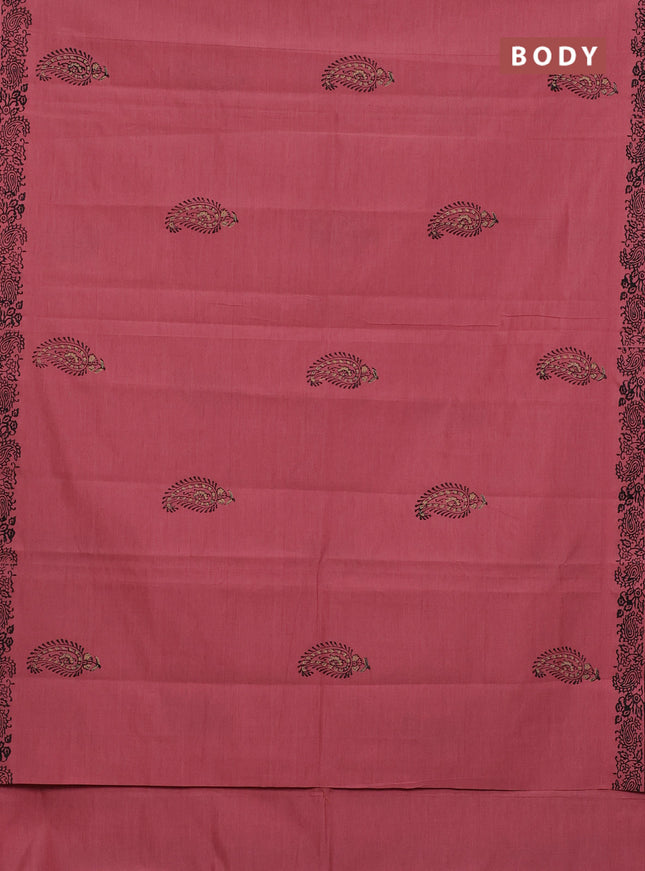 Semi silk cotton saree peach shade and black with butta prints and printed border