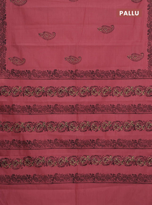 Semi silk cotton saree peach shade and black with butta prints and printed border