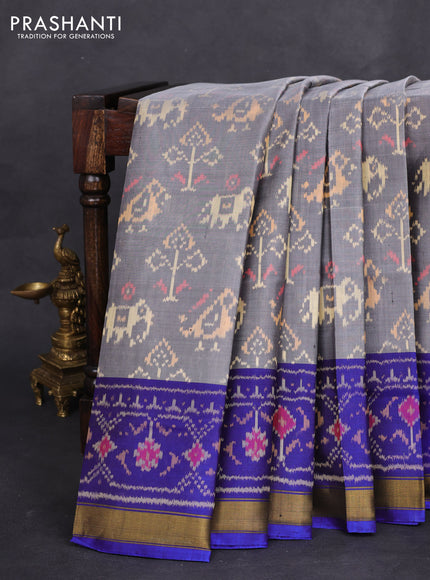 Rajkot patola silk saree grey and blue with allover ikat weaves and zari woven border
