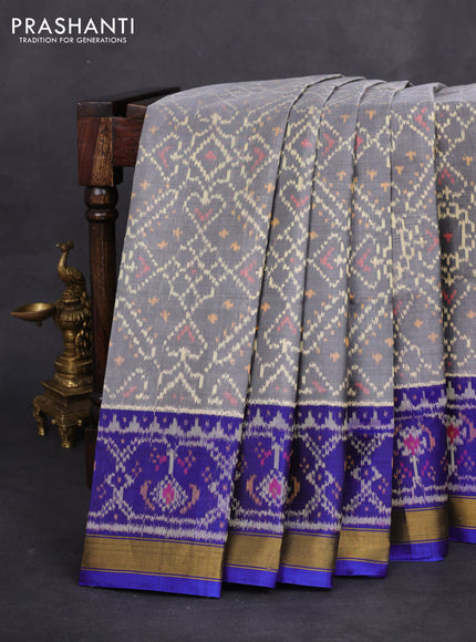 Rajkot patola silk saree grey and blue with allover ikat weaves and zari woven border