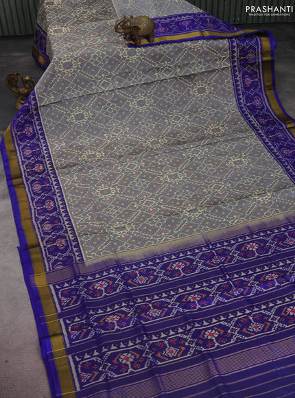 Rajkot patola silk saree grey and blue with allover ikat weaves and zari woven border