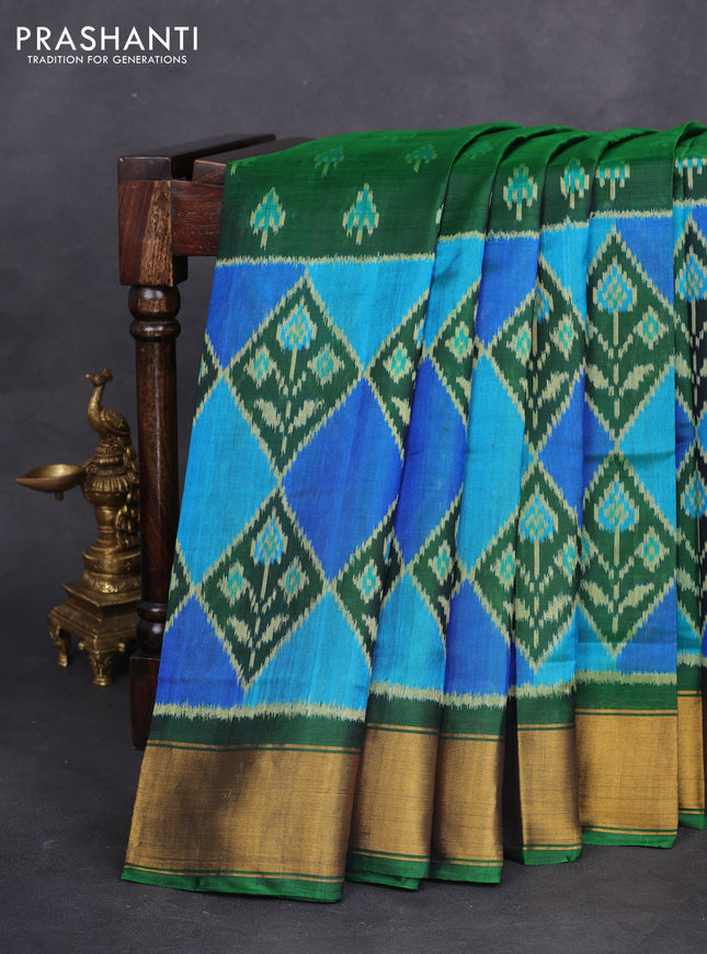 Rajkot patola silk saree green with allover ikat butta weaves and zari woven border
