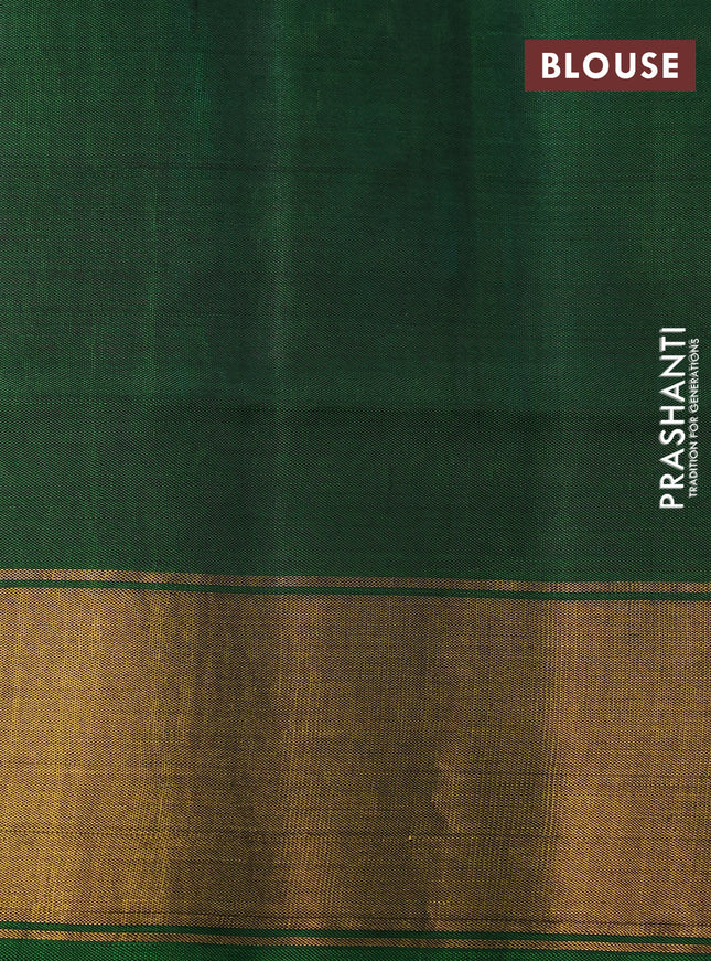 Rajkot patola silk saree green with allover ikat butta weaves and zari woven border