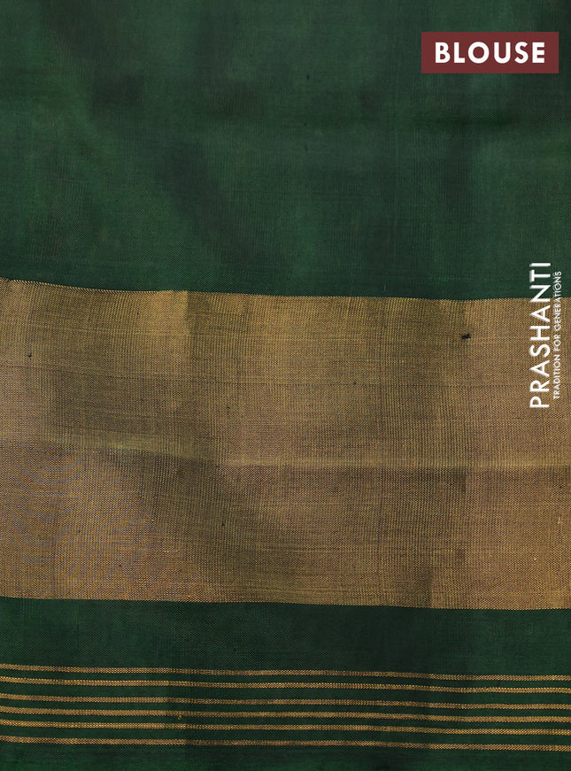 Rajkot patola silk saree dual shade of pink and green with allover ikat weaves and long zari woven border