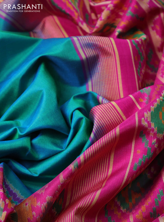 Rajkot patola silk saree teal blue and pink with plain body and long zari woven border