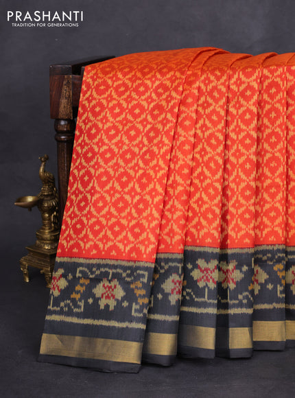Rajkot patola silk saree orange and black with allover ikat weaves and zari woven border