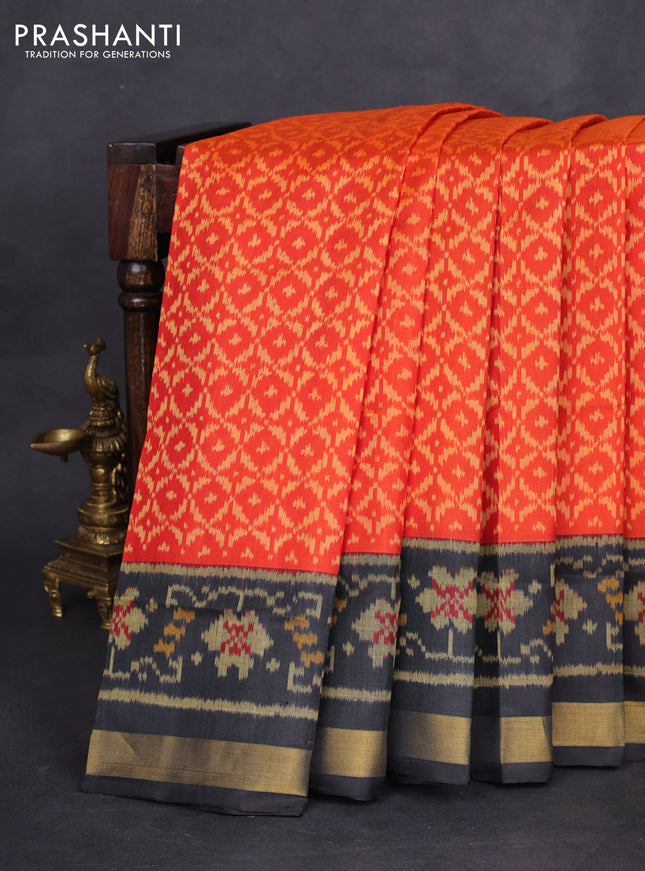 Rajkot patola silk saree orange and black with allover ikat weaves and zari woven border