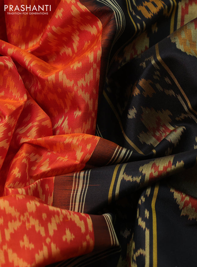 Rajkot patola silk saree orange and black with allover ikat weaves and zari woven border