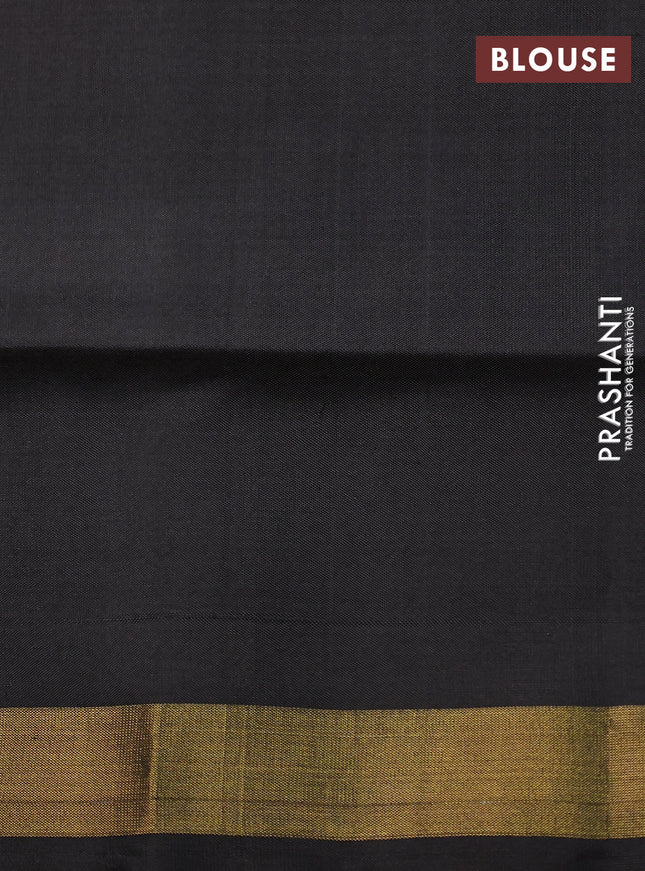 Rajkot patola silk saree orange and black with allover ikat weaves and zari woven border