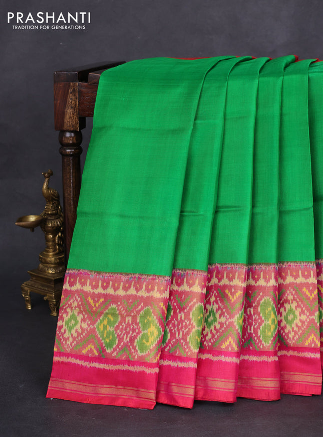 Rajkot patola silk saree light green and pink with plain body and long zari woven border