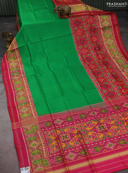 Rajkot patola silk saree light green and pink with plain body and long zari woven border