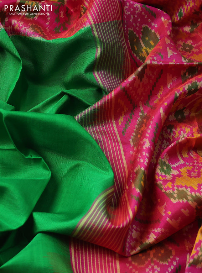 Rajkot patola silk saree light green and pink with plain body and long zari woven border
