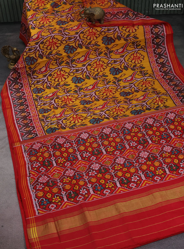 Rajkot patola silk saree yellow and red with allover ikat weaves and zari woven simple border
