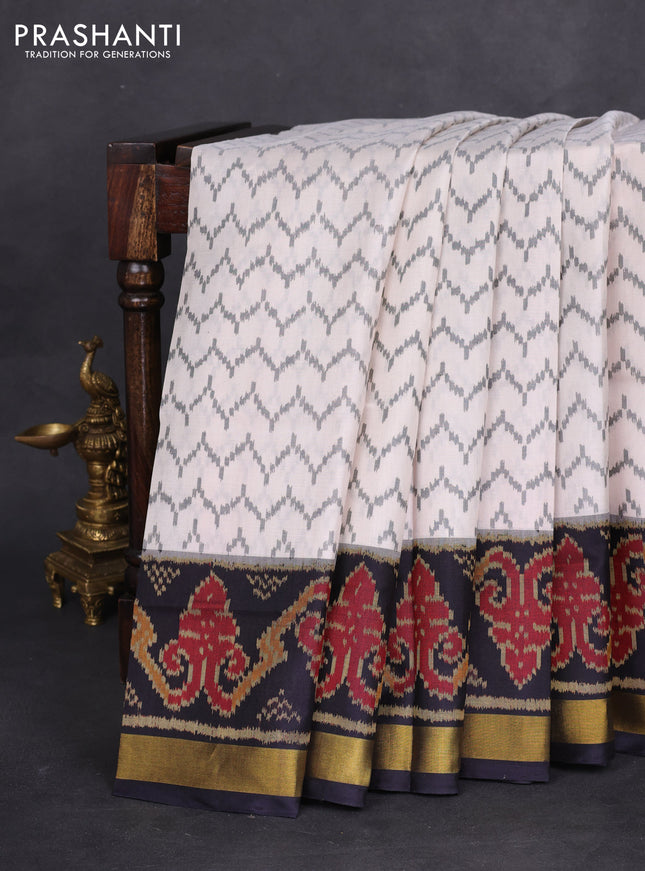 Rajkot patola silk saree off white and black with allover ikat weaves and zari woven border