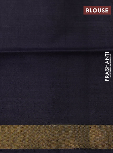 Rajkot patola silk saree off white and black with allover ikat weaves and zari woven border