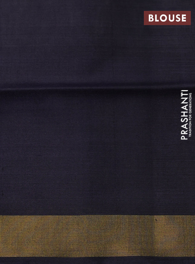 Rajkot patola silk saree off white and black with allover ikat weaves and zari woven border