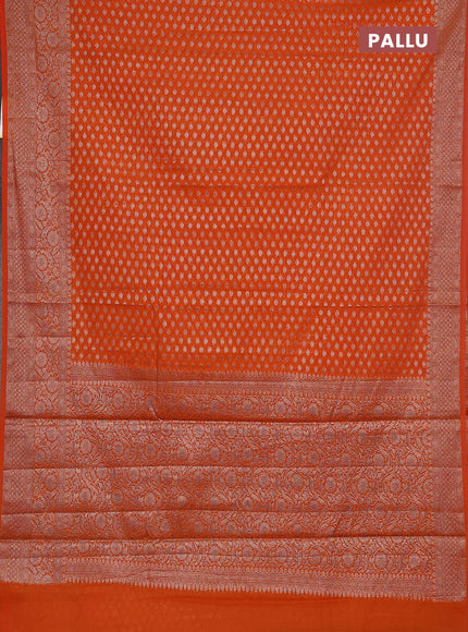 Semi chiniya saree orange with woven buttas and woven border
