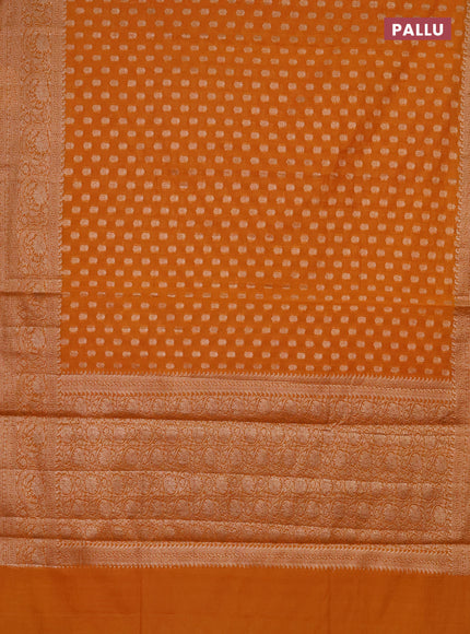 Semi chiniya saree mustard shade with woven buttas and woven border