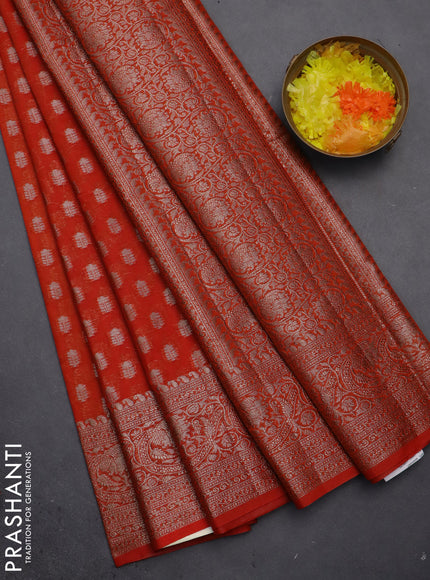 Semi chiniya saree orange with woven buttas and woven border