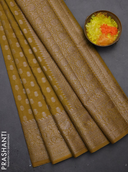 Semi chiniya saree mustard shade with woven buttas and woven border