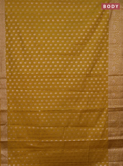 Semi chiniya saree mustard shade with woven buttas and woven border