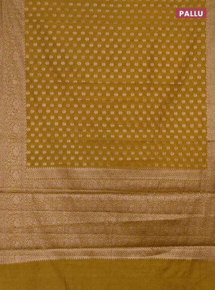 Semi chiniya saree mustard shade with woven buttas and woven border