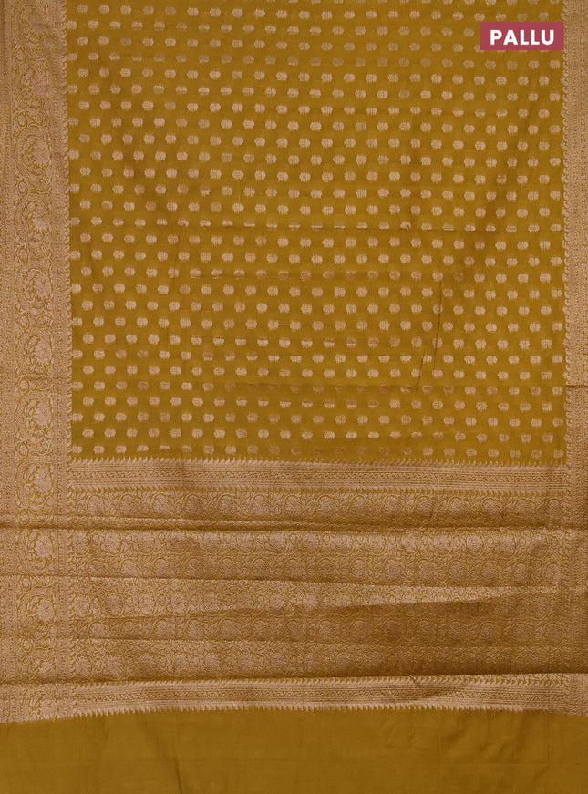 Semi chiniya saree mustard shade with woven buttas and woven border