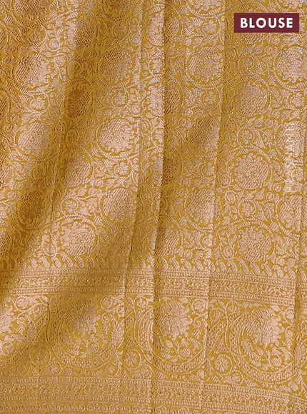 Semi chiniya saree mustard shade with woven buttas and woven border