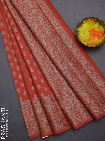 Semi chiniya saree orange with woven buttas and woven border