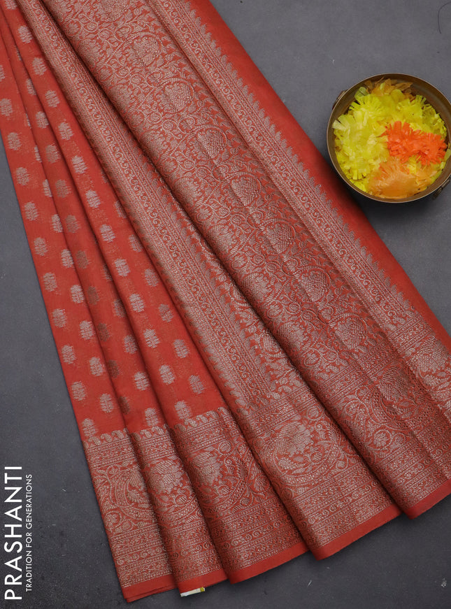 Semi chiniya saree orange with woven buttas and woven border
