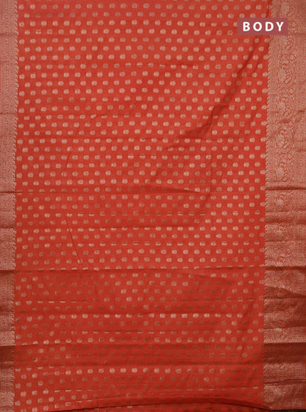 Semi chiniya saree orange with woven buttas and woven border