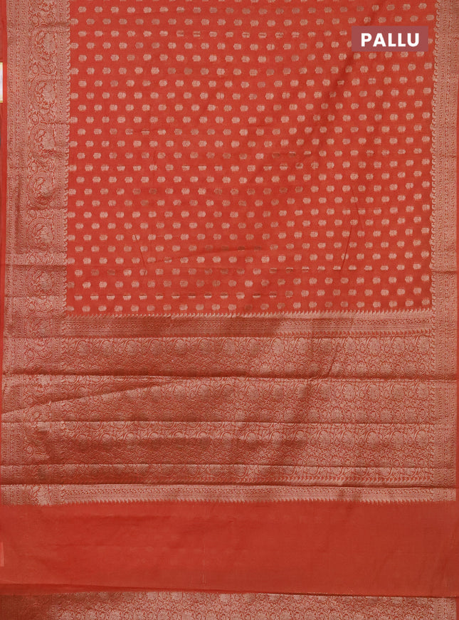 Semi chiniya saree orange with woven buttas and woven border