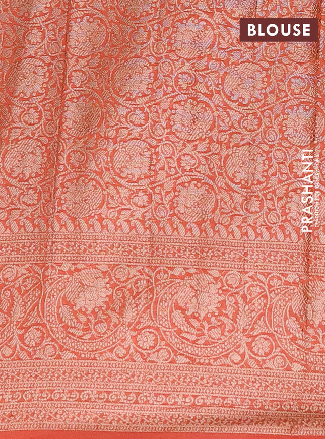 Semi chiniya saree orange with woven buttas and woven border