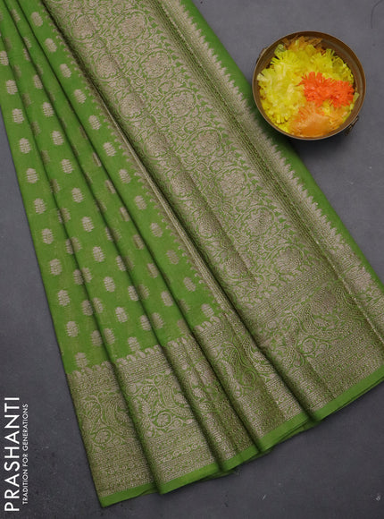 Semi chiniya saree light green with woven buttas and woven border