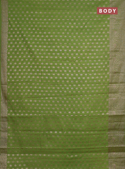 Semi chiniya saree light green with woven buttas and woven border
