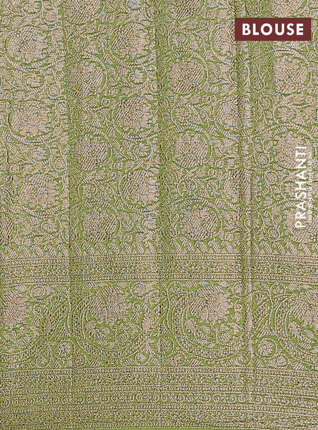 Semi chiniya saree light green with woven buttas and woven border
