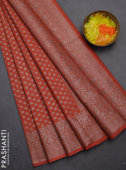 Semi chiniya saree orange with woven buttas and woven border