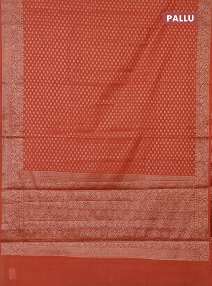 Semi chiniya saree orange with woven buttas and woven border