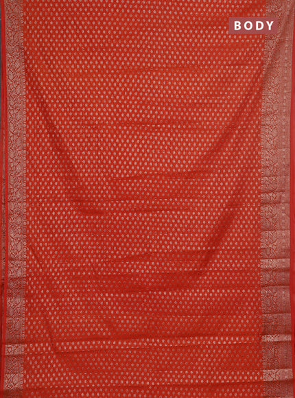 Semi chiniya saree orange with woven buttas and woven border