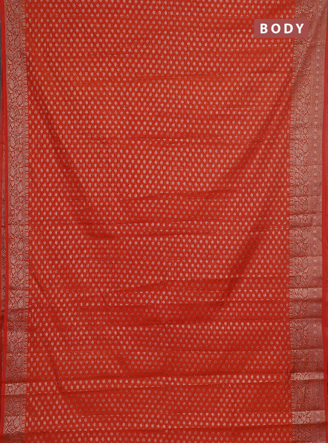 Semi chiniya saree orange with woven buttas and woven border