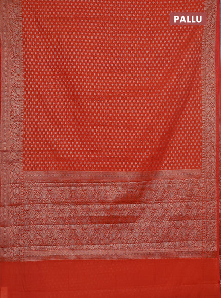 Semi chiniya saree orange with woven buttas and woven border