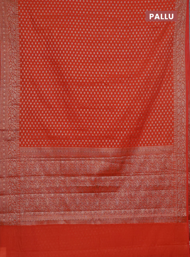 Semi chiniya saree orange with woven buttas and woven border