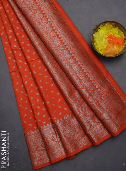 Semi chiniya saree orange with woven buttas and woven border