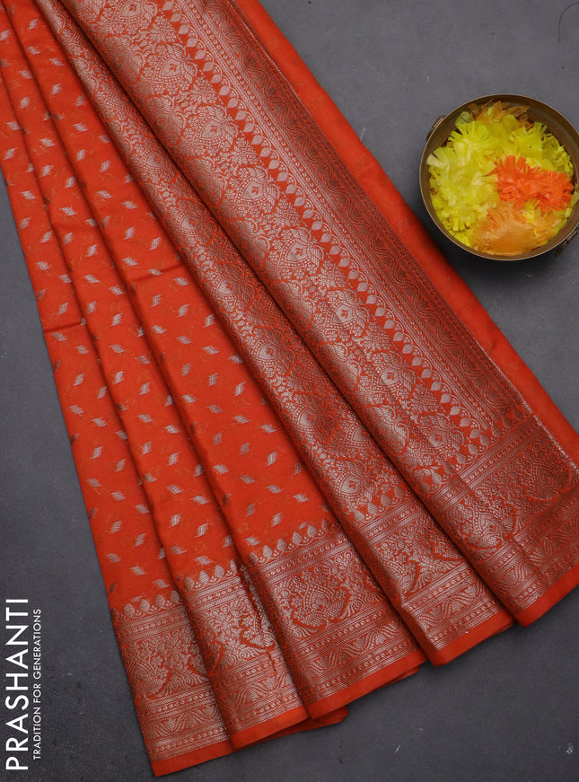 Semi chiniya saree orange with woven buttas and woven border
