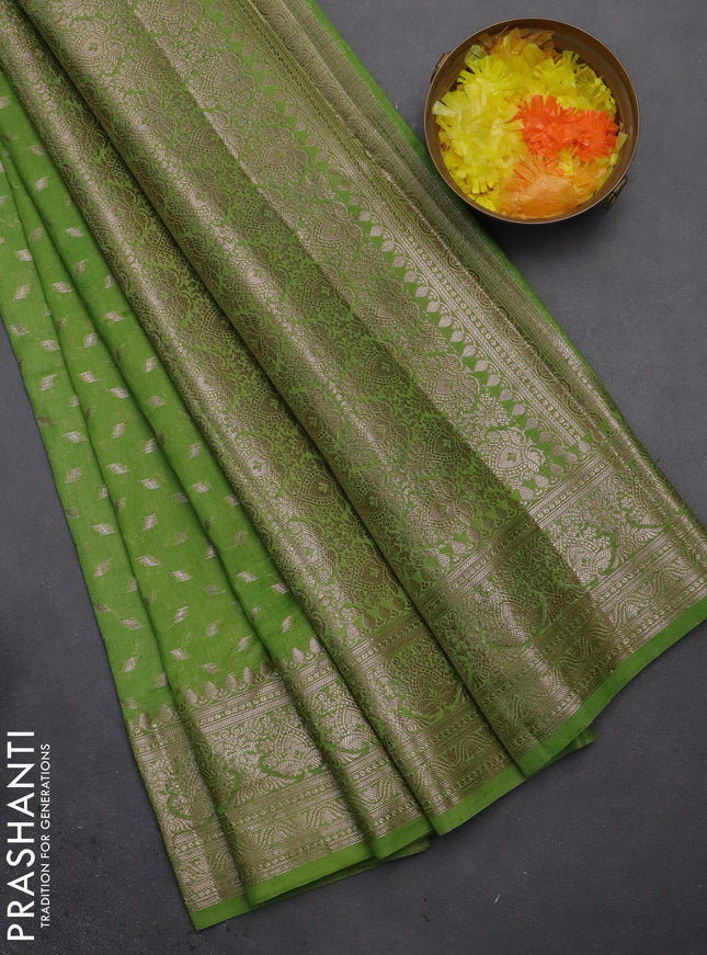 Semi chiniya saree light green with woven buttas and woven border
